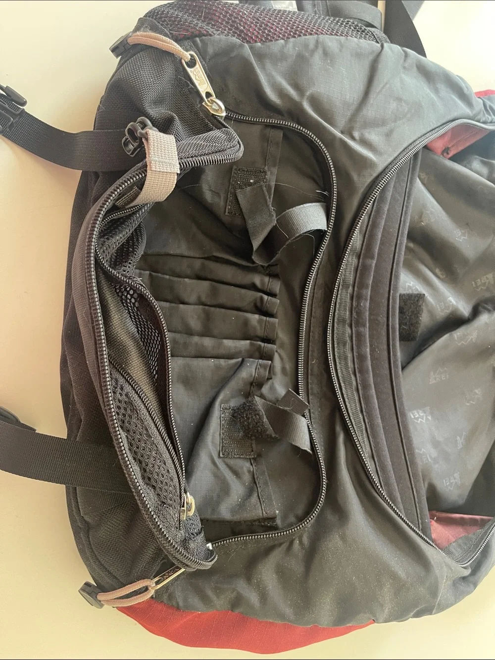 REI Muaette Black and Red Messenger Bag